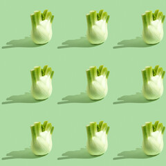 Seamless pattern with fresh fennel on green background.
