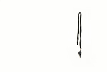 Soccer whistle hanging isolated on white background