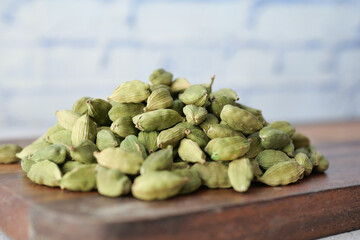 close up of Cardamom on a chopping board 