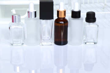 Beauty product bottle or serum bottle on white background