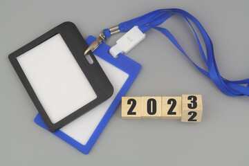 Two blank badges with space for text and numbers 2022 and 2023 on gray background. Accreditation...