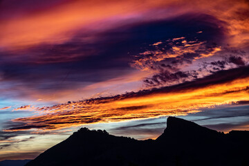 Spectacular cloudy sunset over the Sierra Elvira mountains (Granada, Spain) in autumn