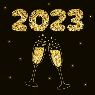 Two sparkling glasses of champagne and lettering 2023 with gold glitter. Dark background with star light.