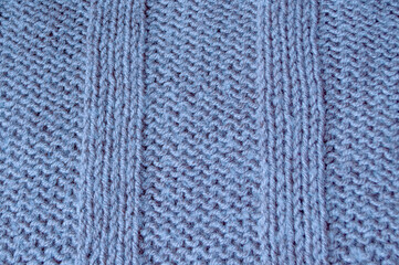 Organic knit material with detail woven threads.