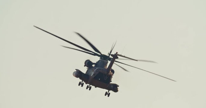 Military helicopter during a rescue mission in a base