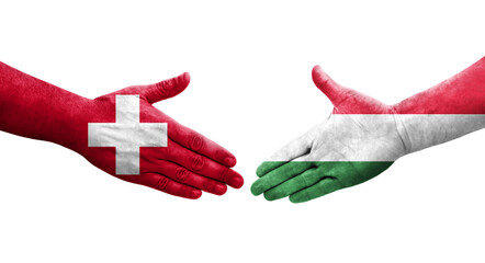 Handshake between Switzerland and Hungary flags painted on hands, isolated transparent image.