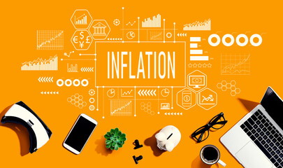 Inflation theme with electronic gadgets and office supplies - flat lay - Powered by Adobe