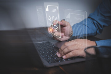 Businessman using a pen signing electronic file agreement of business for no use paper. paperless...