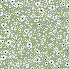 Cute floral pattern. Seamless vector texture. An elegant template for fashionable prints. Print with small white flowers and  leaves,black outline. green  background.