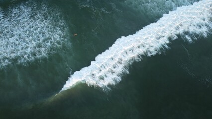 Natural view of strong waves on a beach during summer