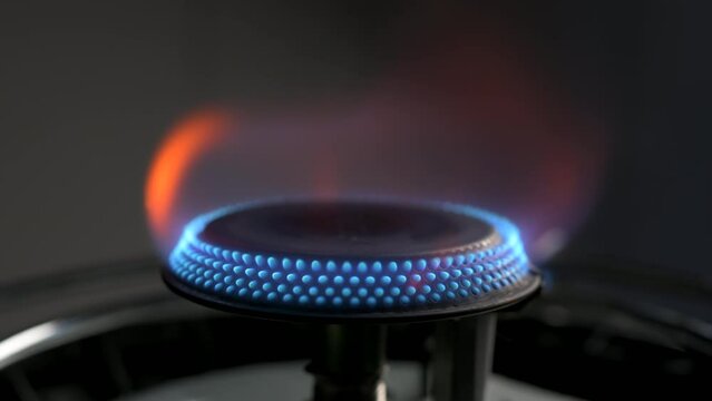 Gas Stove Burner Against Medium Background Slowly Running Out Of Gas