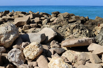 The stones lie on the shores of the Mediterranean Sea.