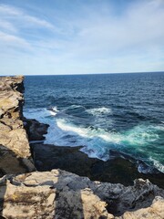 Vertical shot of a rough rocky beach
