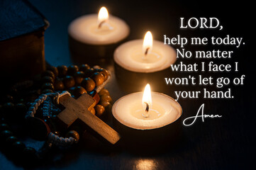 Christian prayer text seeking for help with Holy Rosary and burning candles background. Christian prayer and religion concept