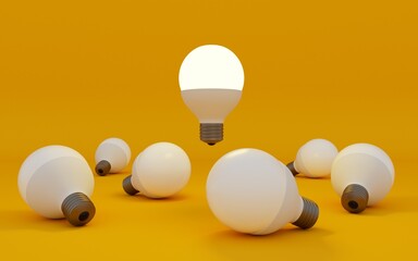 group of off led bulbs around a lit led bulb on a yellow background