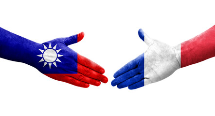 Handshake between Taiwan and France flags painted on hands, isolated transparent image.