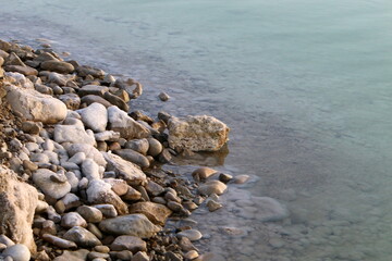 The stones lie on the shores of the Mediterranean Sea.