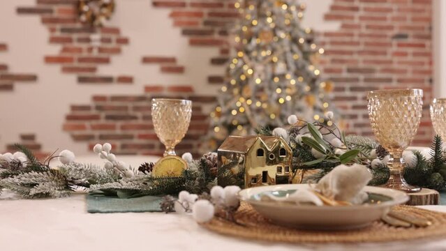 christmas table, Table served, New Year table. Setting with Christmas decorations in the living room, New year's deck blurred bokeh, Rustic vintage Xmas background
