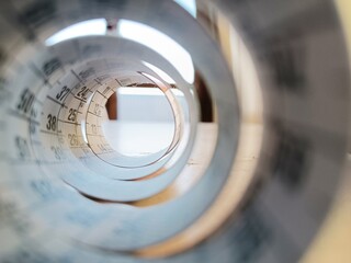 Bright light view through a Meter for tailoring. Abstract futuristic design background.