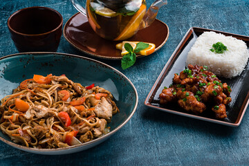 Assorted Chinese food full set. Chinese noodles, fried rice. Famous Chinese cuisine dishes on table