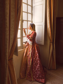 Medieval lady at castle window