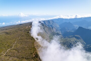Beautiful shot of mountain peaks in the clouds