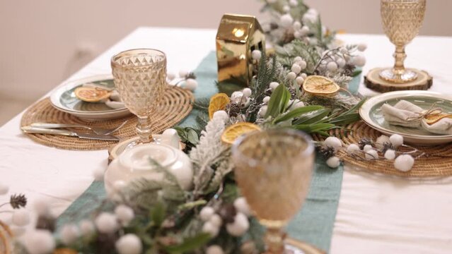 served table, christmas deck, Christmas dinner, elegant table setting with Christmas decorations in living room, Blurred bokeh with a New Year deck table, Rustic vintage Xmas background