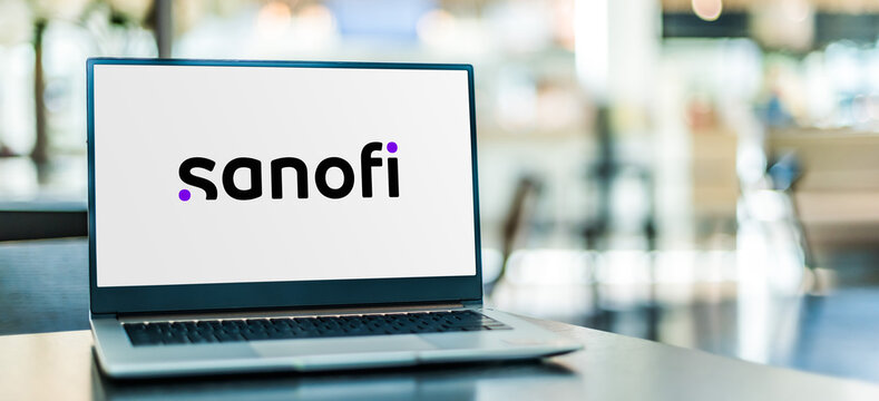 Laptop computer displaying logo of Sanofi