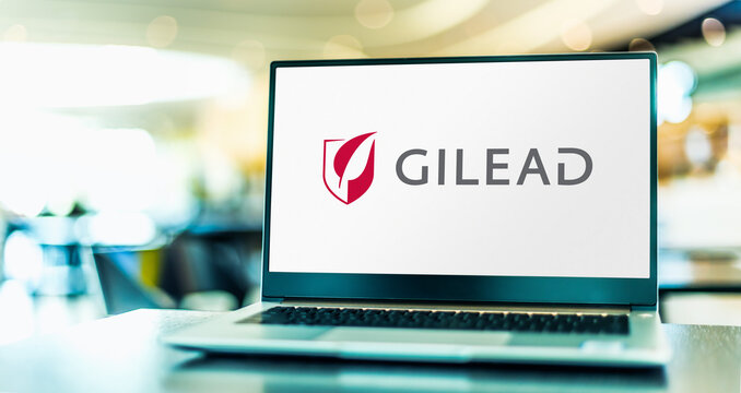 Laptop computer displaying logo of Gilead Sciences