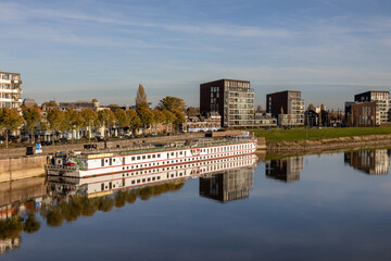 Boat for asylum seekers moored at the quay in Deventer on the river IJssel