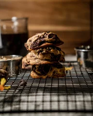 Foto op Plexiglas Beautiful shot of chocolate cookies on a table © Angel Ramirez/Wirestock Creators
