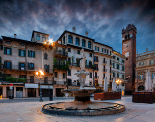 Fototapeta na wymiar View of Piazza delle Erbe in the center of Verona, Italy. At dawn