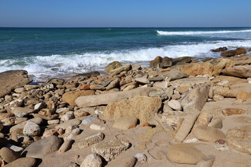 The stones lie on the shores of the Mediterranean Sea.