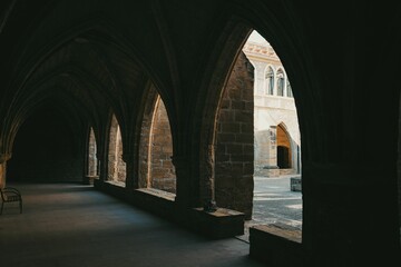 Dark corridor of an old stone building