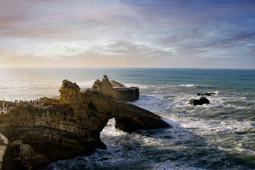 Fototapeta na wymiar Sunset on the famous rock of the Virgin in the city of Biarritz on the Basque coast