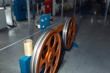 production of glass fiber fiber optic cable in the factory, Internet telecommunications wires in...