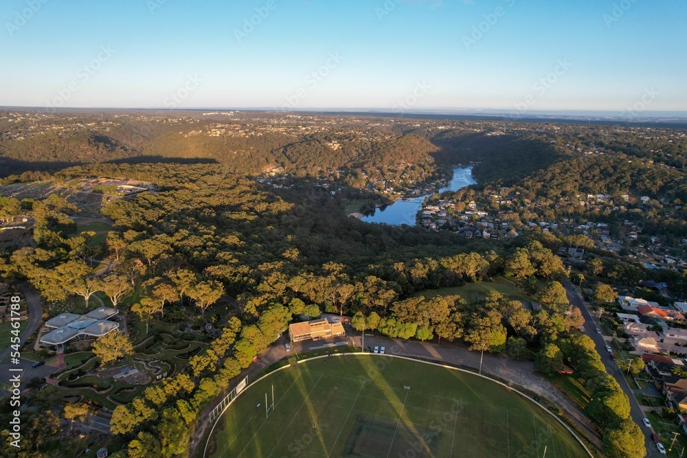 Poster sutherland oval, woronora river and sutherland suburb surrounded by lush greenery, sydney, australia