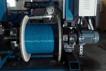production of glass fiber fiber optic cable in the factory, Internet telecommunications wires in...