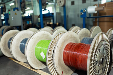 production of glass fiber fiber optic cable in the factory, Internet telecommunications wires in...