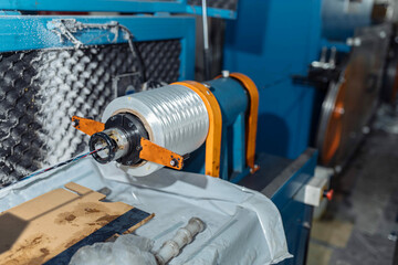 production of glass fiber fiber optic cable in the factory, Internet telecommunications wires in...