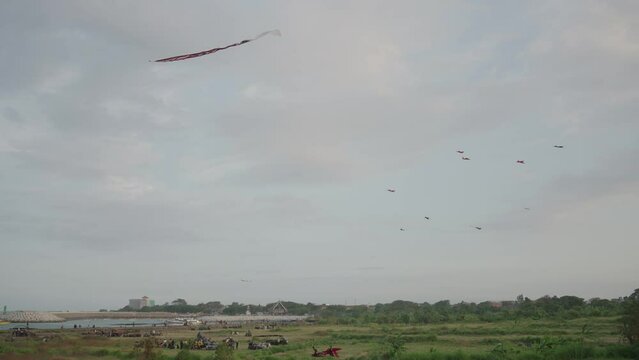 Balinese Traditional Kites JANGGAN and BEBEAN on Bali Kite Festival Summer Sky Slow Motion