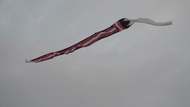Balinese Traditional Kites JANGGAN and BEBEAN on Bali Kite Festival Summer Sky Slow Motion