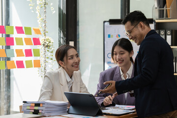 Group of business consultant working management big data and analyze financial document of company