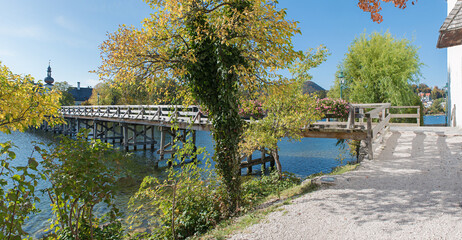Fototapeta na wymiar bridge from Ort island, to Gmunden tourist destination. lake Traunsee Salzkammergut austria
