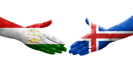 Handshake between Tajikistan and Iceland flags painted on hands, isolated transparent image.