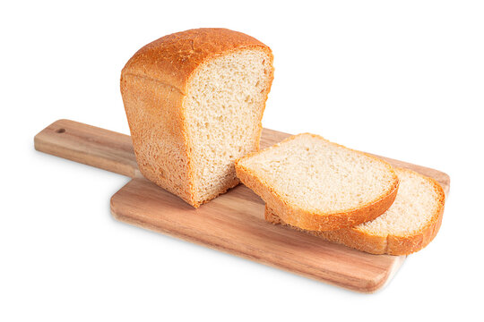 Homemade organic baked loaf of bread made of wheat flour and yeast sliced on wooden cutting board isolated on white background used as source of carbohydrates and vegetable proteins served as snack