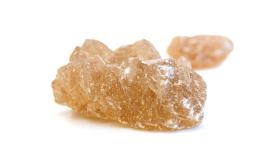 Brown sugar cubes isolated on white background
