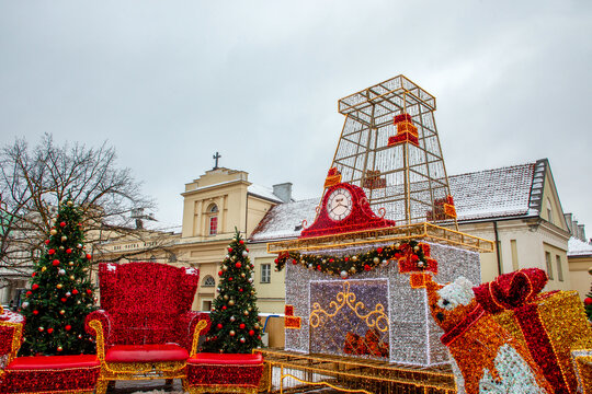 Christmas decorations in downtown of Warsaw  -  chairs and Christmas tree and gifts  from papier mache