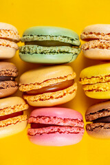 Close-up of macarons cakes of different colors .Culinary and cooking concept. Tasty colorful macaroons.