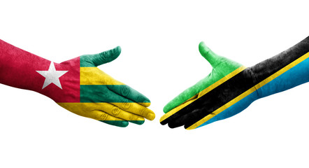 Handshake between Tanzania and Togo flags painted on hands, isolated transparent image.